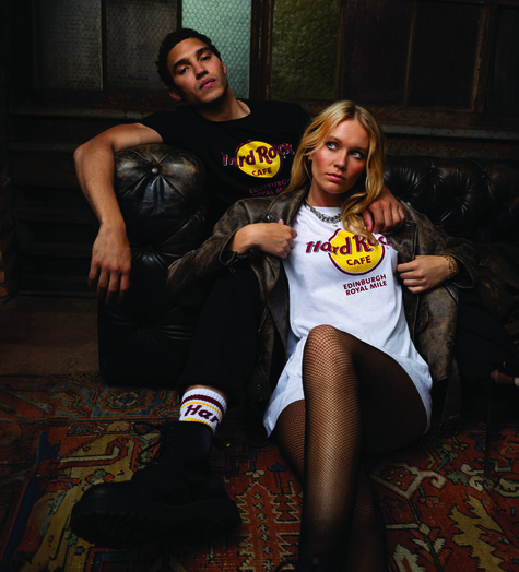 a man and woman sitting on a couch