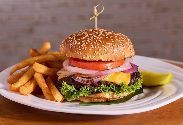 Cheeseburger and fries at Beach Club Bar & Grill