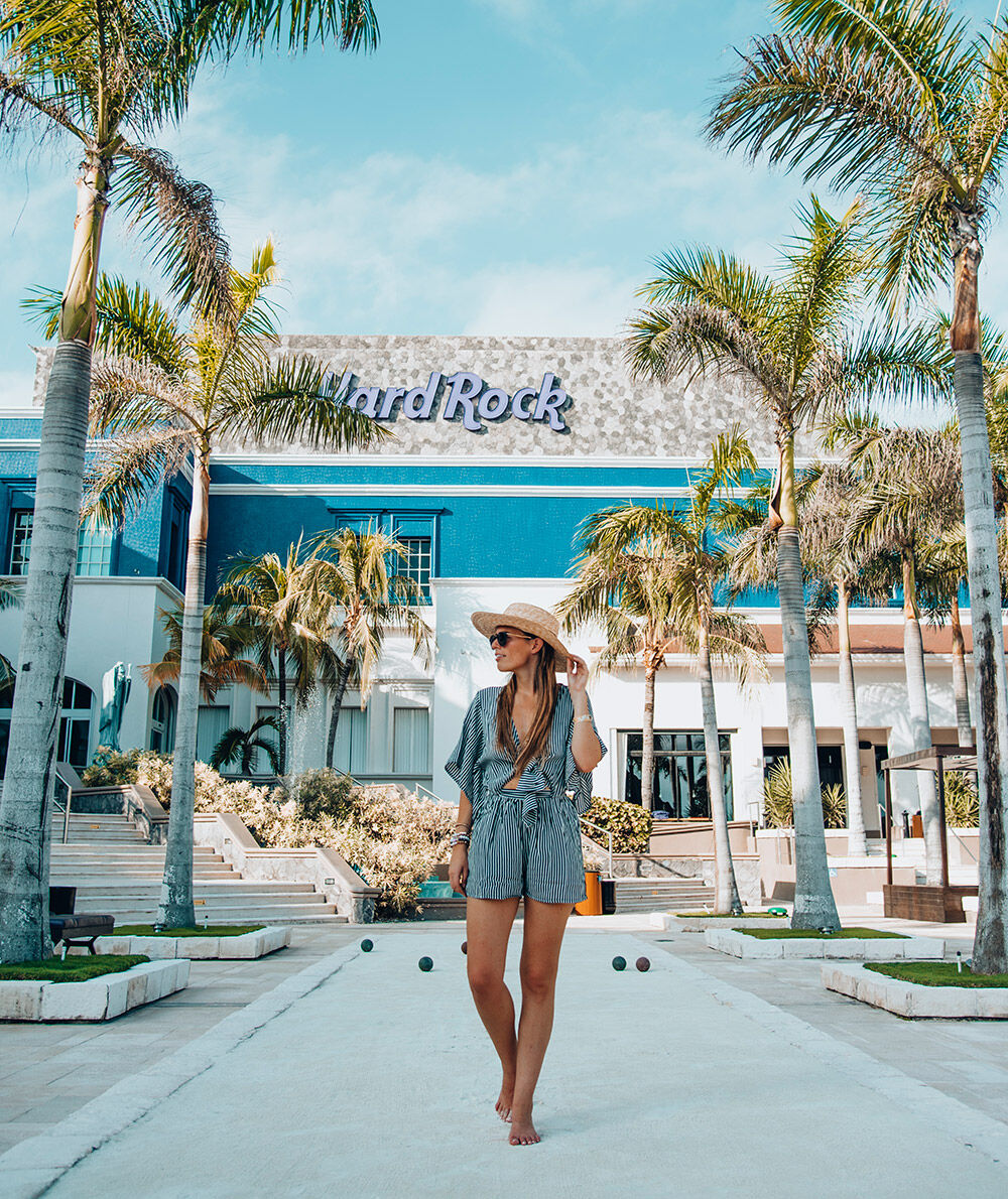 Woman walking in front of Hard Rock Hotel Riviera Maya